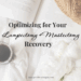 Coffee, book, basket and flowers on a bed. text reads Optimizing for your lumpectomy+mastectomy recovery