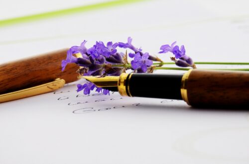 Fountain Pen with purple flower and paper. DCIS treatment options