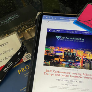flatlay of ASBRS programs and badges. DCIS matters