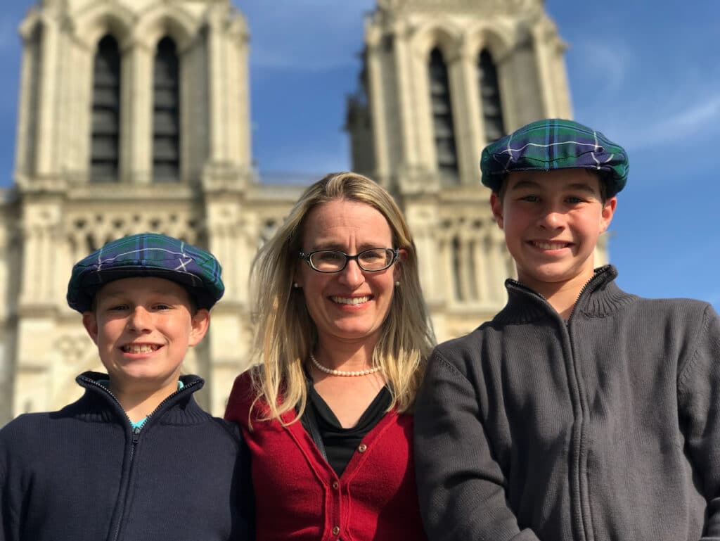 Author and family in front of Notre Dame