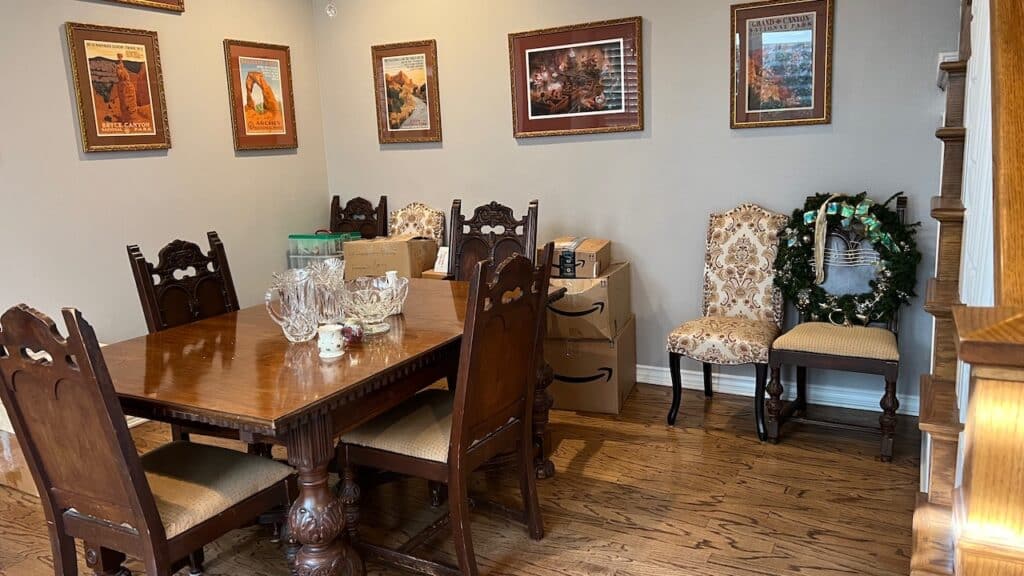 Author's dining room with holiday boxes along the wall.