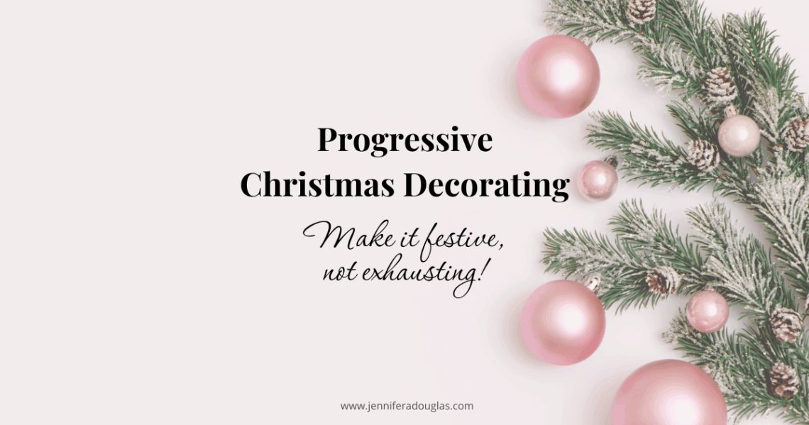 White backdrop with pine branches and pink christmas ornaments. Text reads progressive christmas decorating: Make it festive not exhausting
