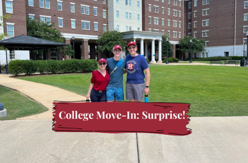 Author, son and husband in front of a University of Alabama residence hall.