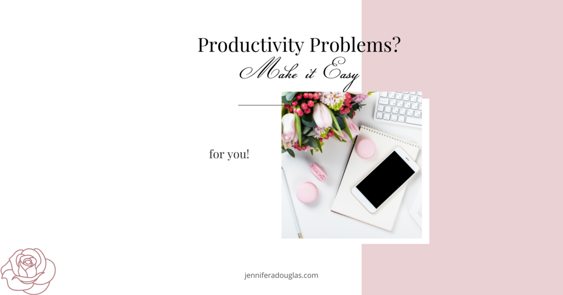 White and pink graphic with a desk flatlay. test reads productivity problems, make it easy for you.