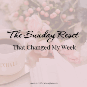 Coffee in mug that reads exhale with flowers on a bed. Text reads "the Sunday Reset that changed my week