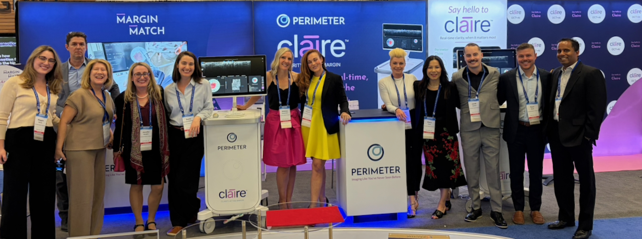 Image of the Perimeter staff at a conference